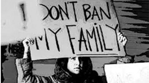Article Image - Muslim Girl with Sign