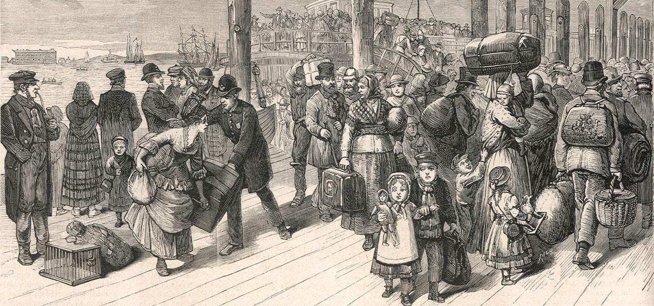 black and white image of immigrants disembarking a ship