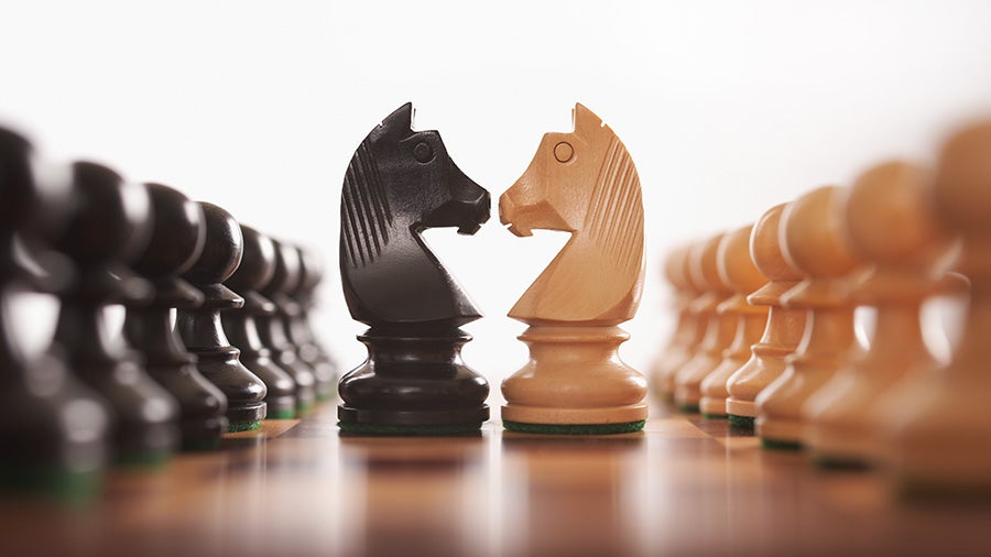 opposing chess pieces