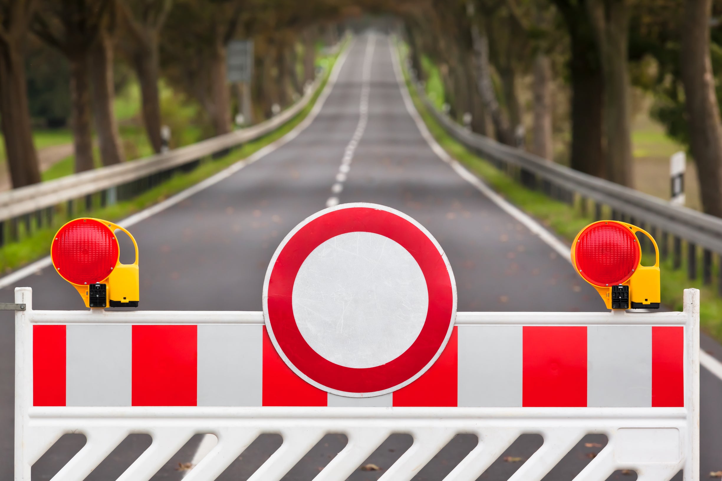 red and white roadblock
