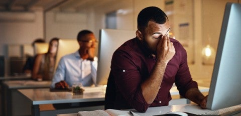 burnt out worker at desk