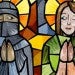 stained glass image of women looking suspiciously at each other