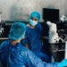 young doctors working with microscopes
